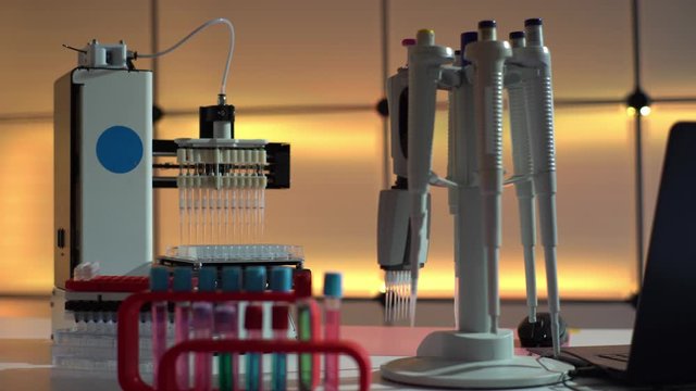 Workbench in microbiological lab with PCR machine