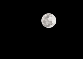 close up full moon in the black sky
