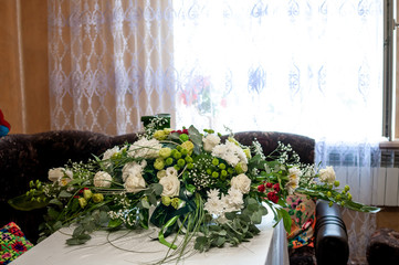 Colorfull bouquet of flowers lying on the table