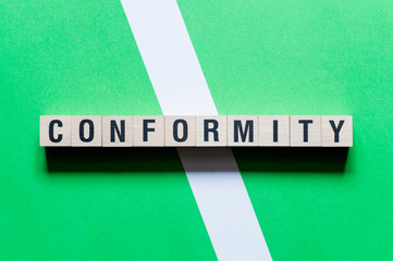 Conformity - word concept on cubes