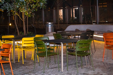 empty tables and chairs