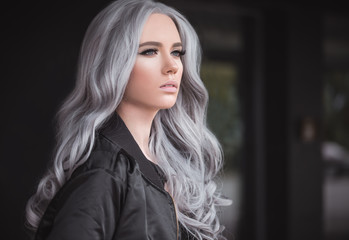 Gorgeous girl with healthy long grey hair outdoor