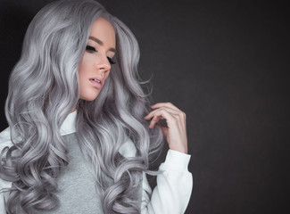 Portrait of beautiful girl with healthy long grey hair