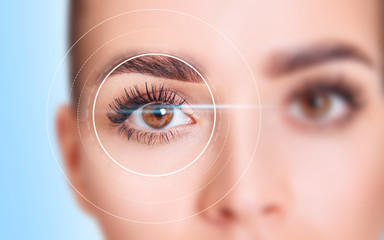 Female eye in digital biometric scanning.