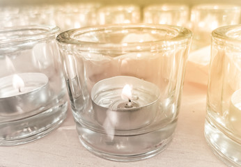 Candles in small little glasses during the vigil ceremony and prayer.