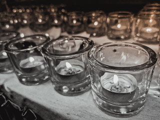 Candles in small little glasses during the vigil ceremony and prayer.