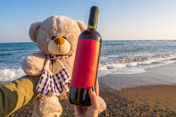 Bottle of wine on the beach