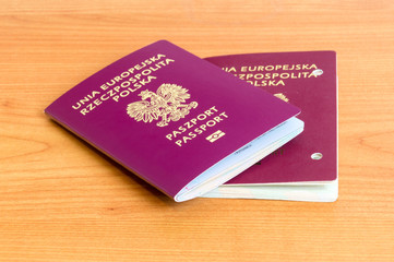 New and canceled Polish biometric passport with holes on the side.