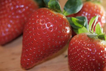 strawberries on wooden background