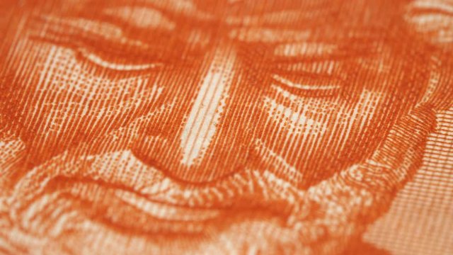 Aristotle portrait on 10000 Greece drachma (1947) banknote rotating. Genius Ancient Greek philosopher, tutor of Alexander the Great. Low angle, macro. 4K, 422 10 bit