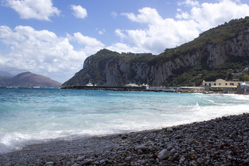 Fototapeta na wymiar coast beach blue water of mediterranean sea italy island beach port travel summer vacation tour