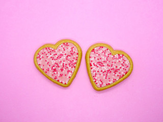 Two Valentine heart shape cookies