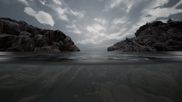 Half underwater in northern sea with rocks