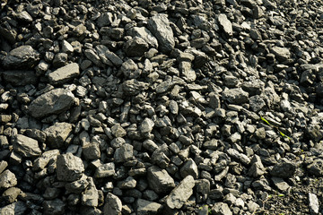 Pile of industrial coal. Fuel and power generation, nature pollution theme