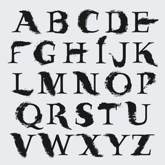 Custom alphabet. Serif style lettering with hand drawn brush stroke.