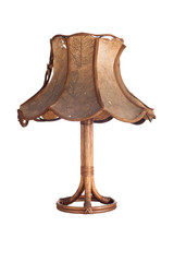 very old and damaged desk lamp isolated on white background