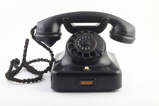 old vintage phone isolated on white background