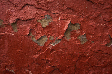 Red wall with peeling paint