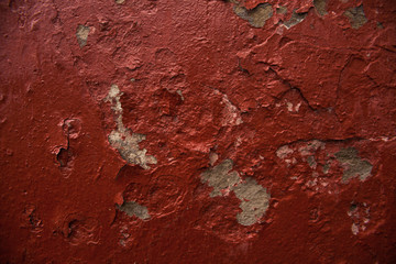 Red wall with peeling paint