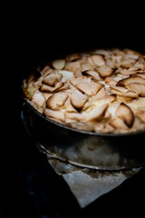 Home baking apple Tsvetaevsky aspic open pie in the oven, close-up. Baking concept. Family dinner....