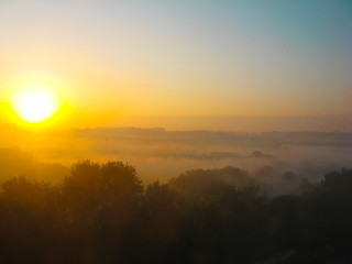 Incredible Dawn. Beautiful Sunrise, A Valley In The Morning Mist. Aerial View.