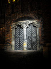 Vintage doors to the Gothic temple, two illuminated doors. A philosophical view of the idea of eternal choice.