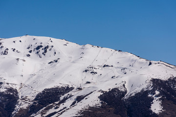 Landscape view of snow-capped Mount Catedral during winter in Bariloche, Patagonia, Argentina