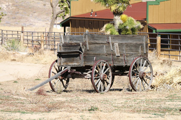 Fototapeta na wymiar old west abandoned vintage wagon