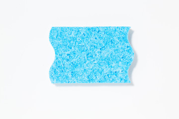 A blue sponge isolated on white background. Top view.