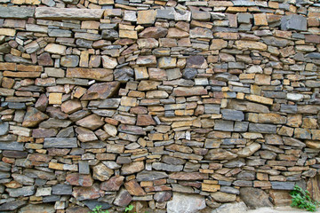 Wall of small natural stones