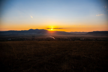 Fototapeta na wymiar Landscape on the hill at the sunset