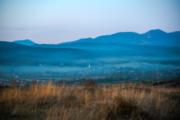Landscape on the hill at the sunset