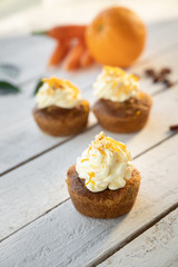 carrot cake cupcake bite size dessert snack homemade baked dessert cream orange peel decoration board composition cafe bistro