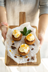 carrot cake cupcake bite size dessert snack homemade baked dessert cream orange peel decoration board composition cafe bistro