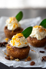 carrot cake cupcake bite size dessert snack homemade baked dessert cream orange peel decoration board composition cafe bistro