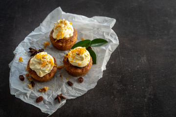 carrot cake cupcake bite size dessert snack homemade baked dessert cream orange peel decoration board composition cafe bistro