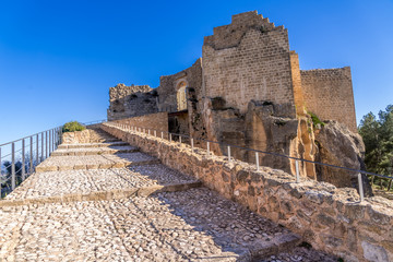 Fototapeta premium Aerial view of medieval ruined Montesa castle center of the Templar and Montesa order knights with donjon, long ramp to the castle gate in Spain