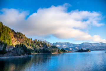 Obraz premium Colibita Lake in a sunny day, Romania