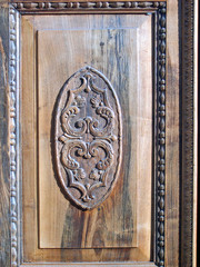 Italy, Umbria, Sassoferrato antique door decoration.