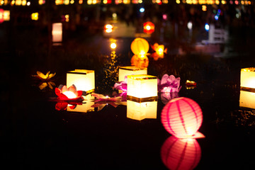  chinese paper lanterns on the water