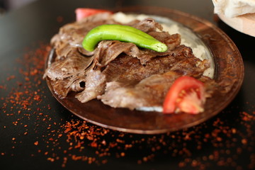 Turkish Doner Kebab with rice on the dinner plate