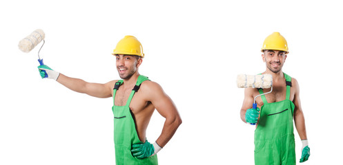 Painter in green coveralls on white