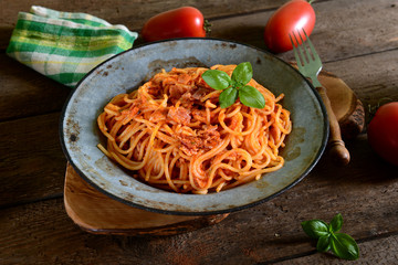 Tasty spaghetti pasta with tomato sauce