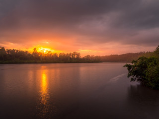 Fototapeta na wymiar Colourful River Sunrise