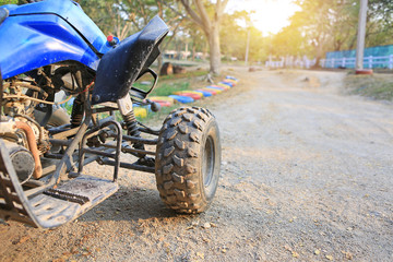 Old go-kart waiting for driver to drive in the track outdoor.