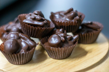 chocolate  praline  with mixed nut background