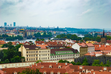 Obraz premium Prague cityscape as seen from Prague Castle. The photo is taken at a cloudy afternoon.