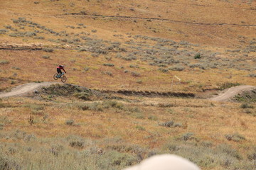 Mountain bikers enjoy the thrill of downhill biking at Deer Valley resort in Park City, Utah.
