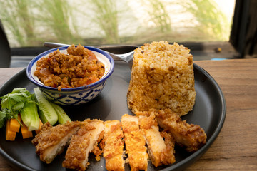 Fried rice with chili paste and Thai fried pork