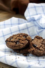Chocolate chip cookies on blue fabric